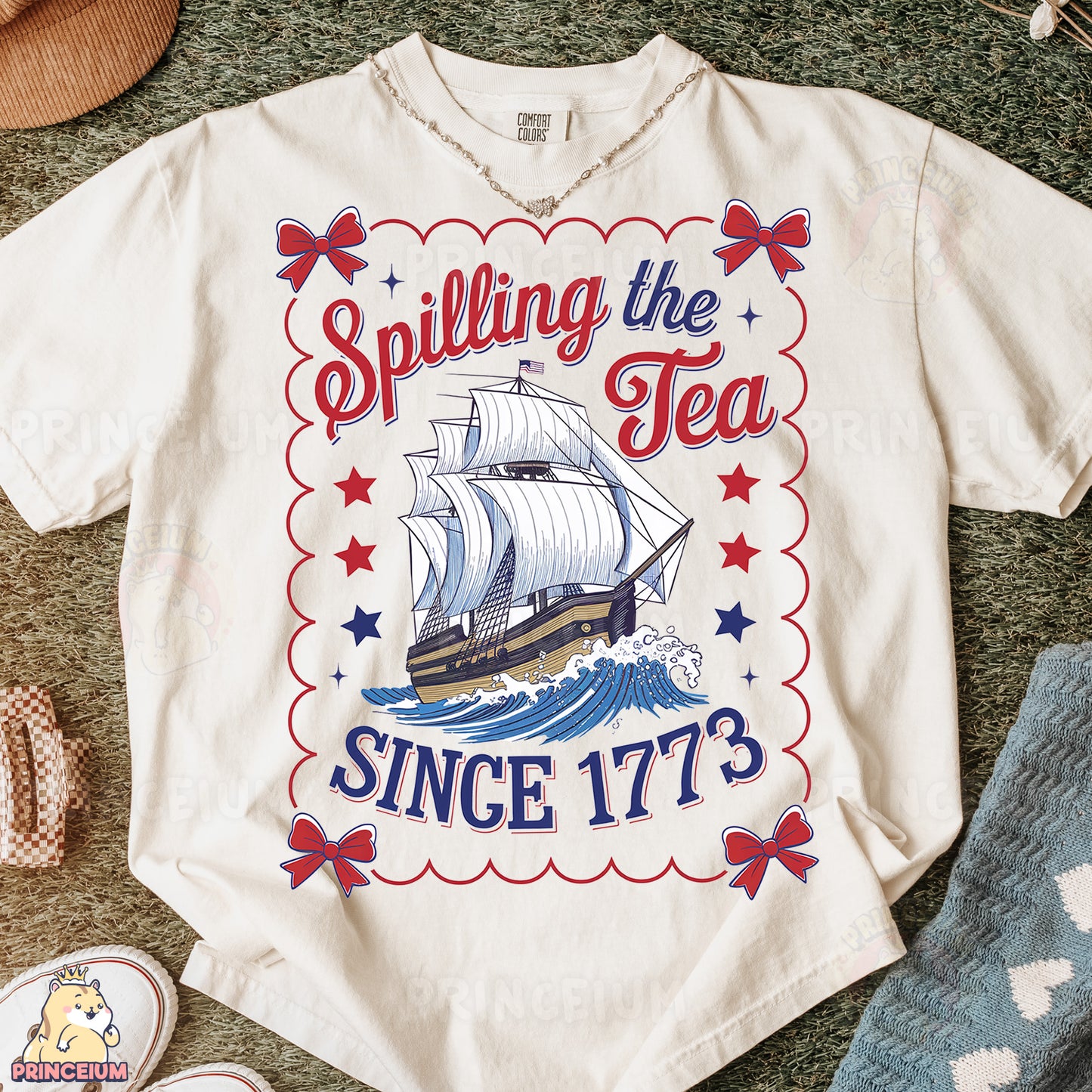 a t - shirt with a sailing the tea since it's written on it