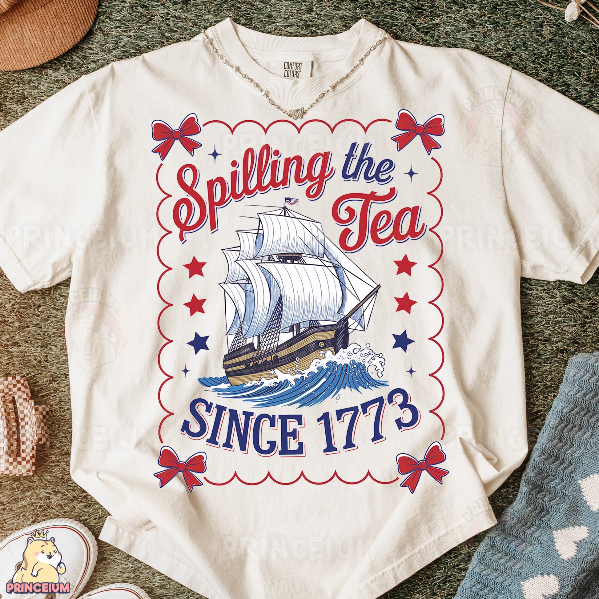 a t - shirt with a sailing the tea since it's written on it
