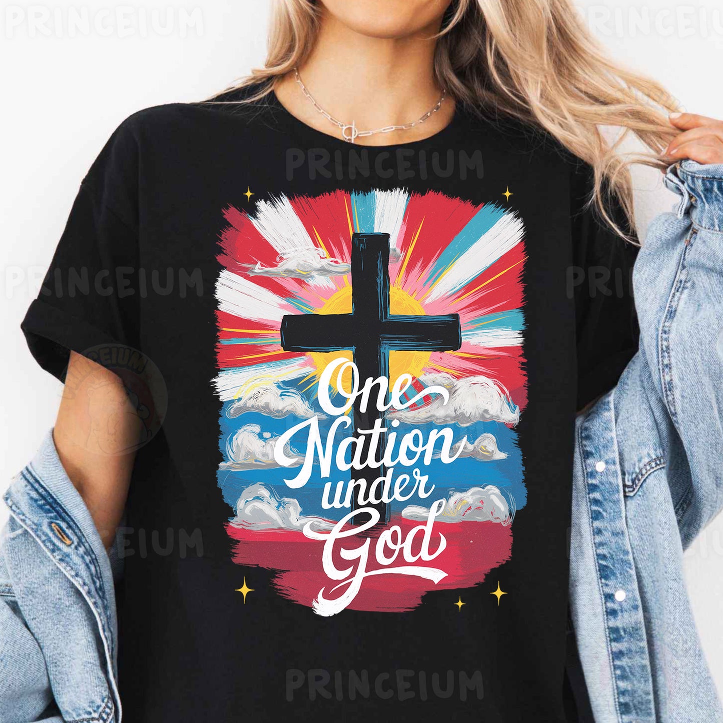 a woman wearing a black t - shirt with a cross on it