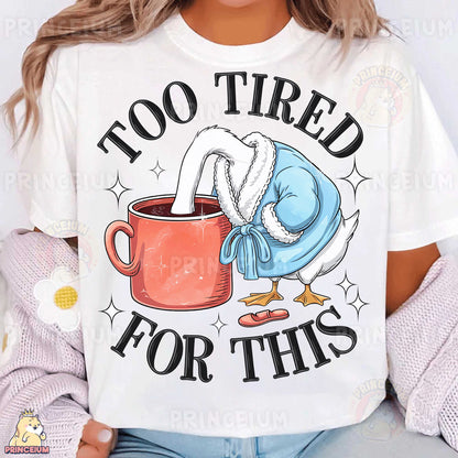 a woman wearing a t - shirt that says too tired for this