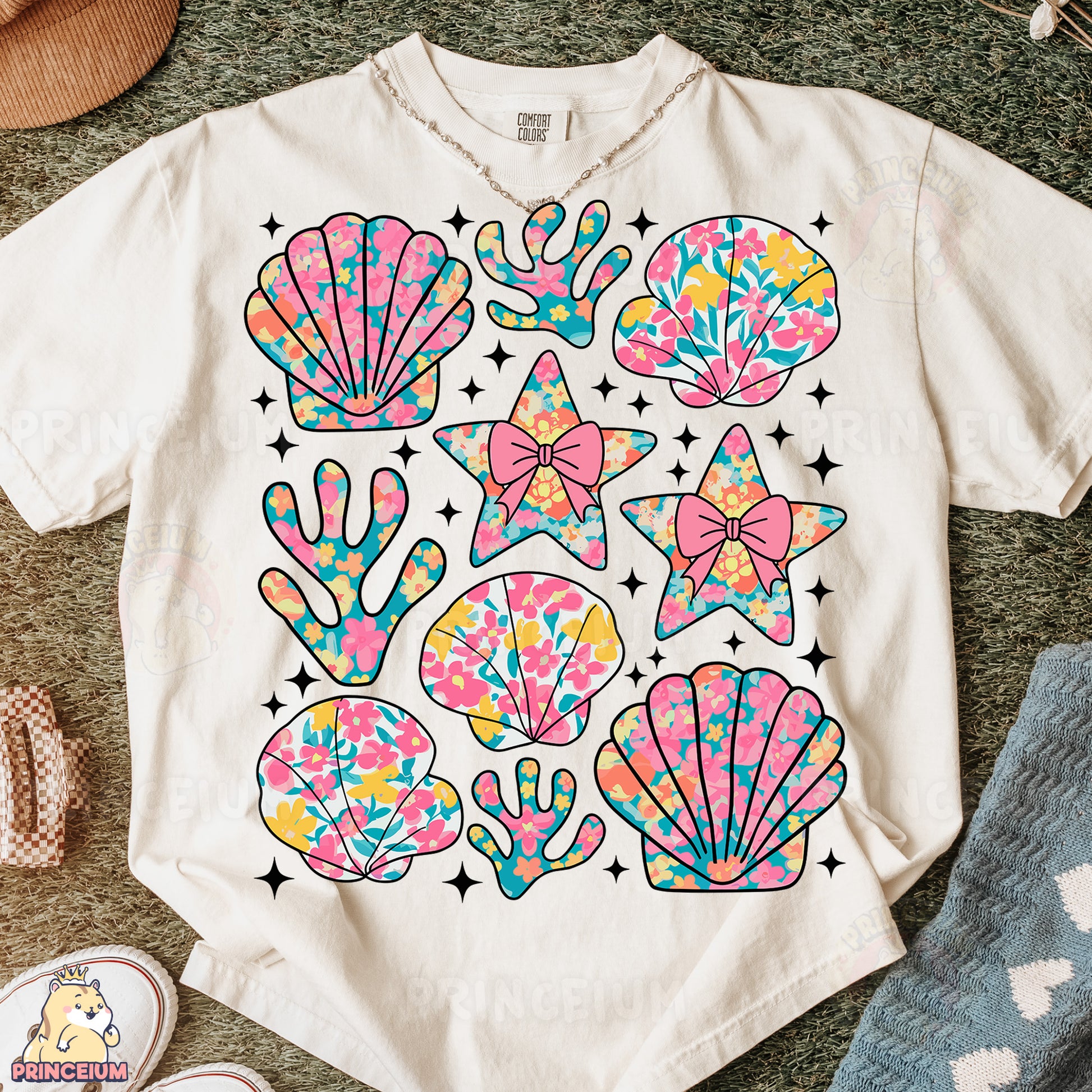 a t - shirt that has a bunch of seashells on it