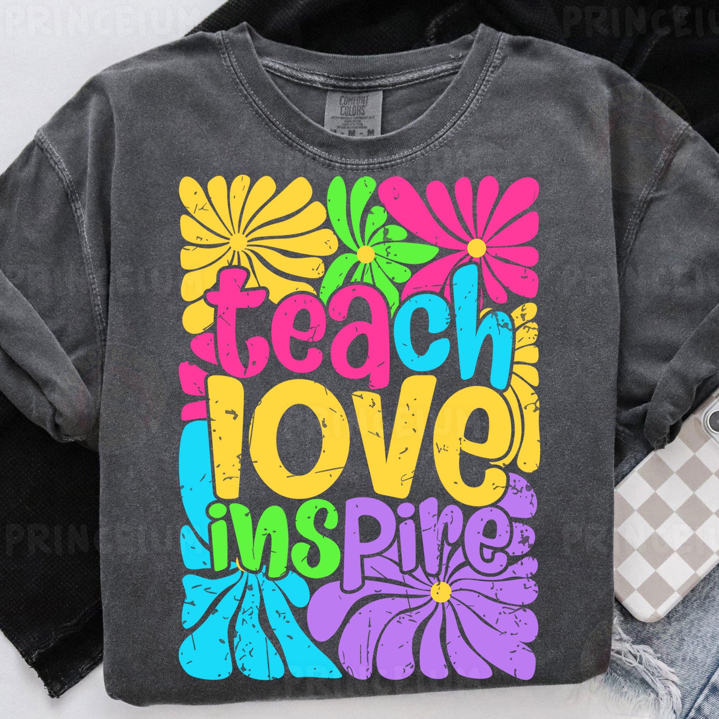 a t - shirt that says teach love inspires