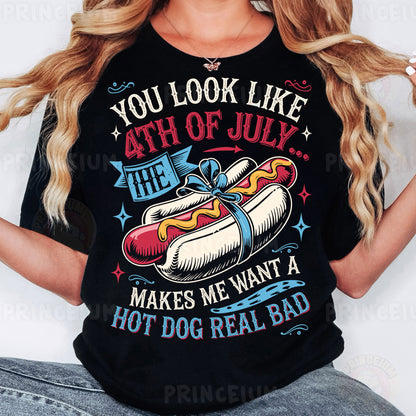 a woman wearing a black shirt with a hot dog on it