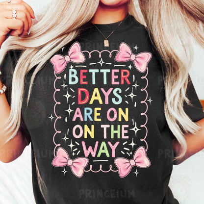 a woman wearing a t - shirt that says better days are on the way