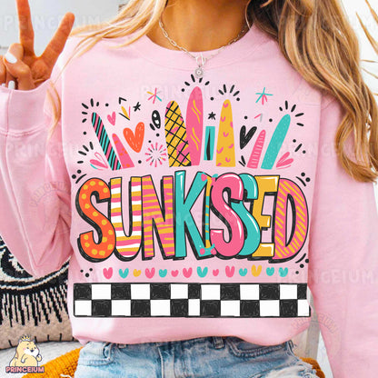 a woman wearing a pink sweatshirt that says sunked