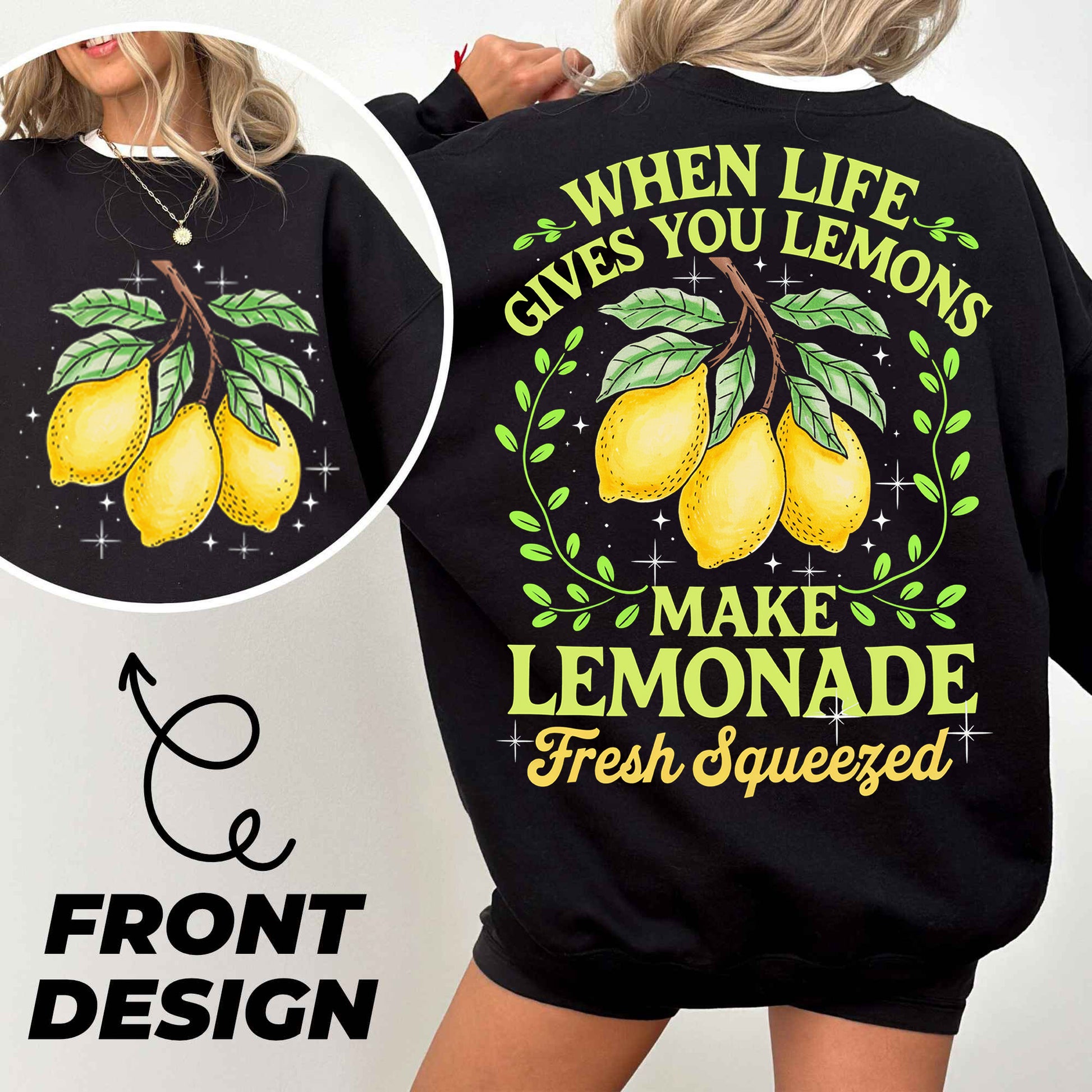 a woman wearing a black sweatshirt with lemons on it