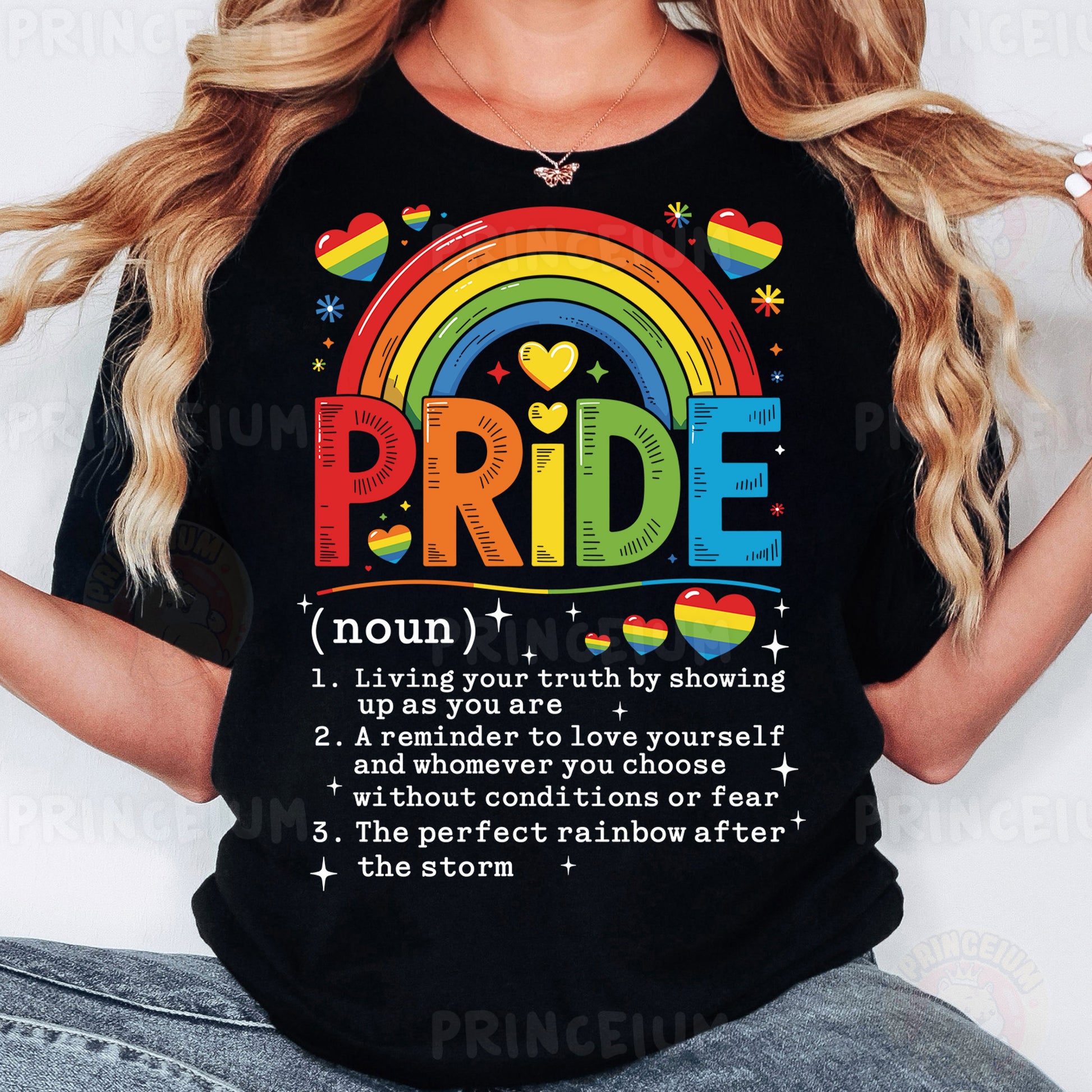 a woman wearing a black pride t - shirt