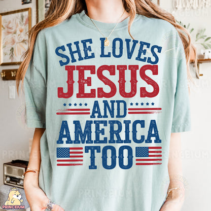 a woman wearing a t - shirt that says she loves jesus and america too