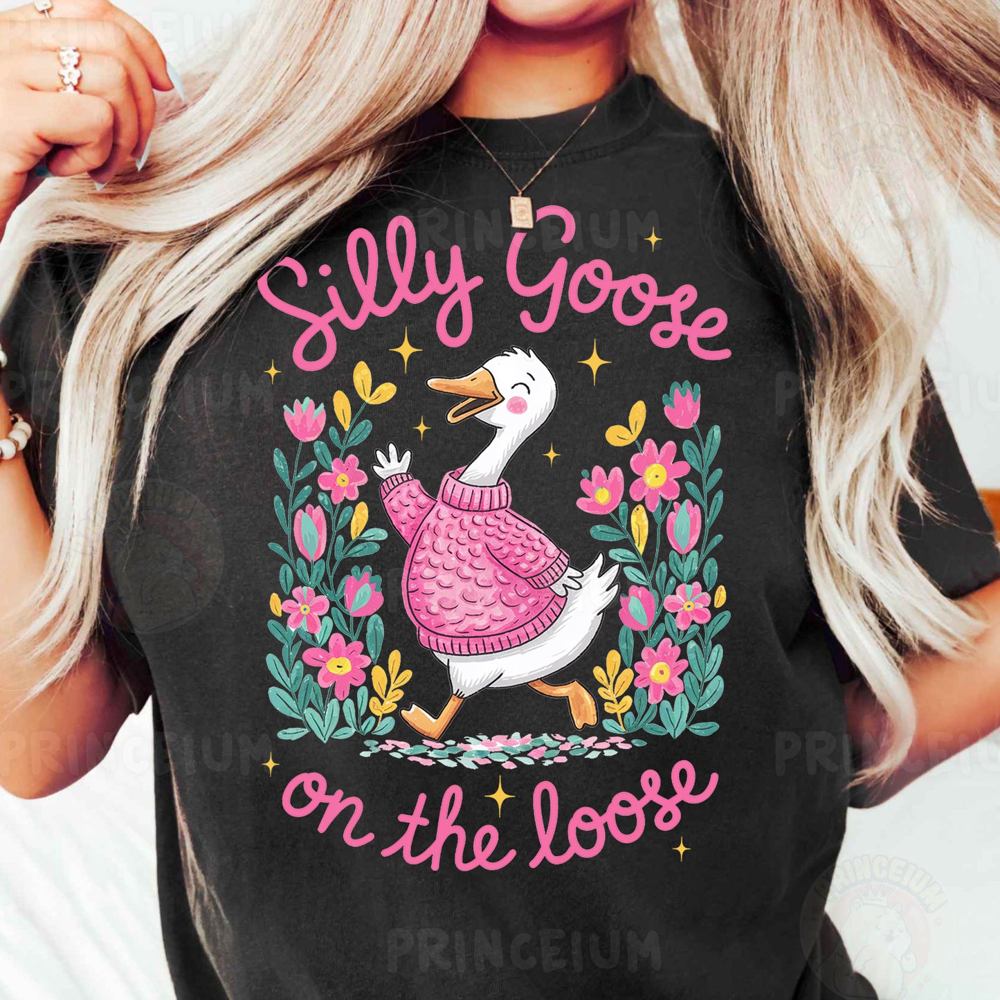 a woman wearing a t - shirt with a goose on it