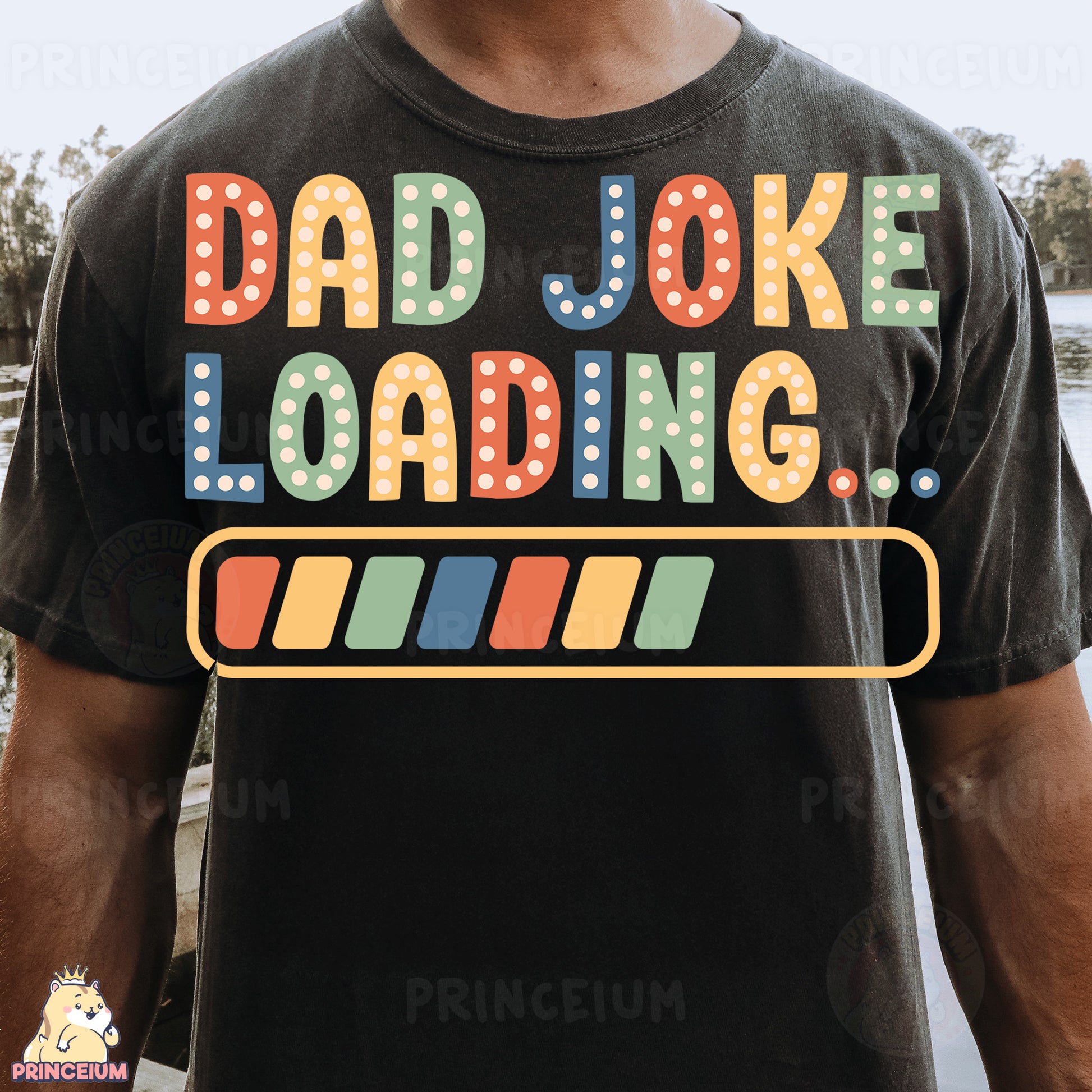 a man wearing a t - shirt that says dad joke loading