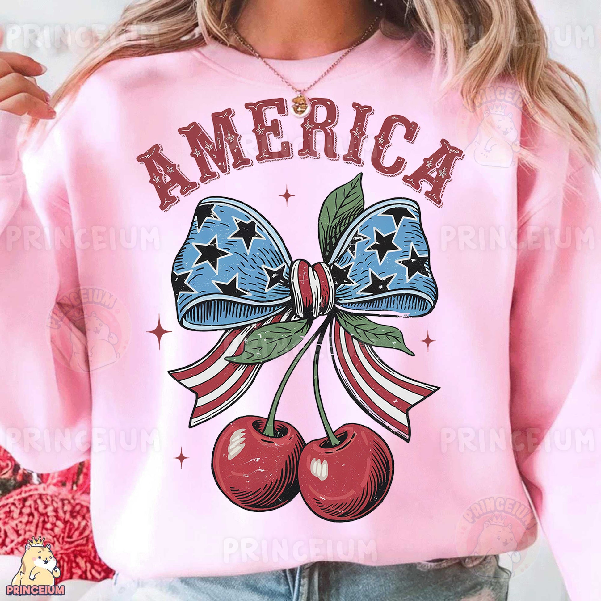 a woman wearing a pink sweatshirt with a bow and two cherries on it