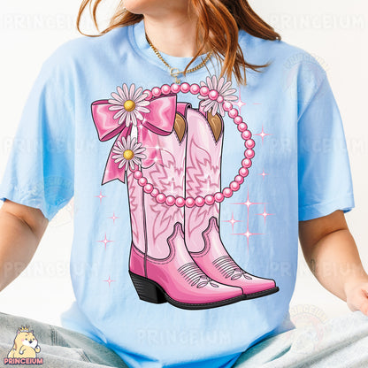 a girl wearing a pink cowboy boot with a pink flower on it