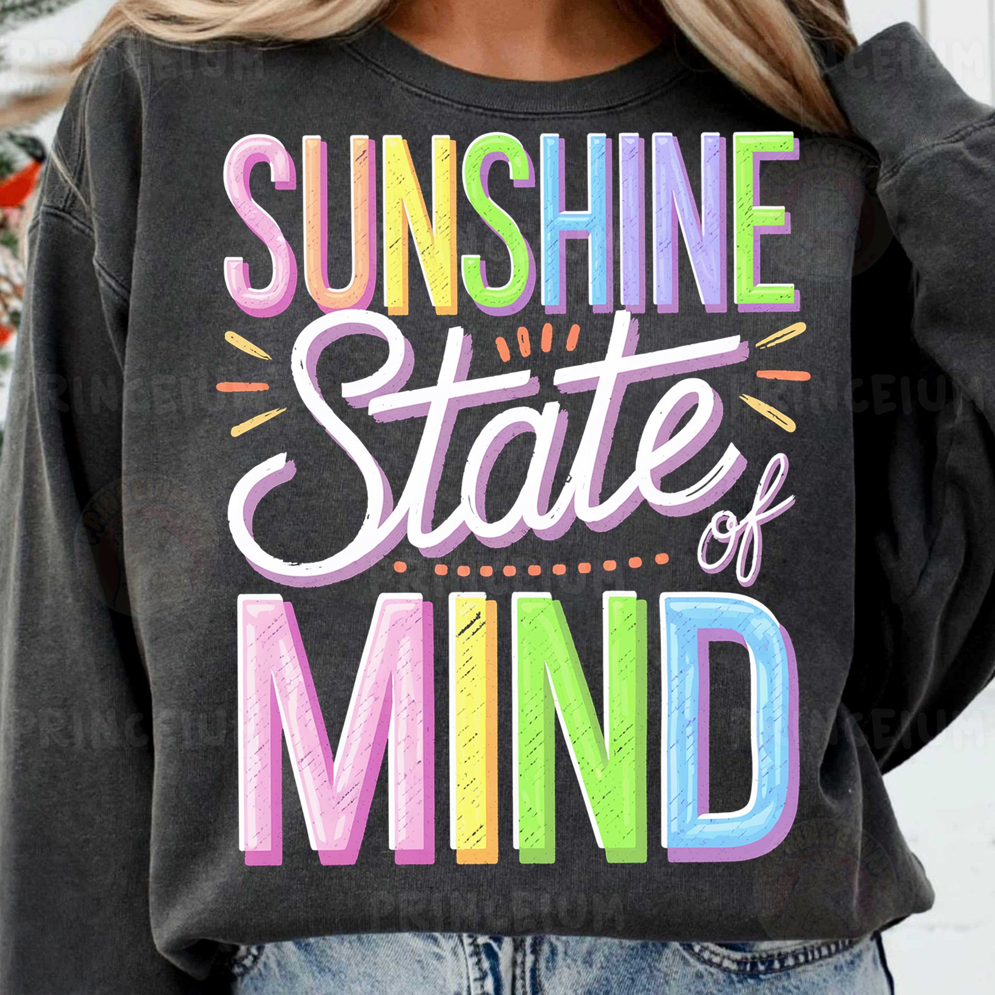 a woman wearing a sweatshirt that says sunshine state of mind