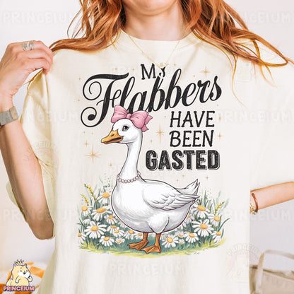 a woman wearing a t - shirt with a picture of a duck on it
