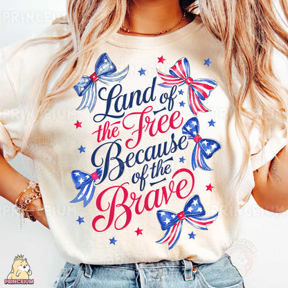 a woman wearing a t - shirt that says land of the free because of the