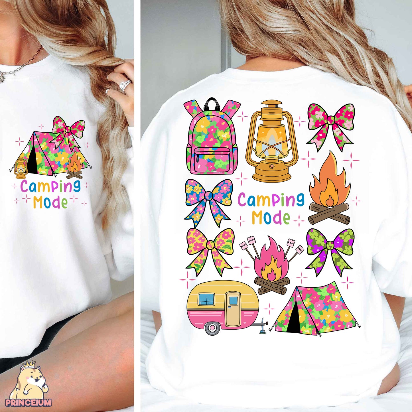 a woman wearing a white shirt with camping designs on it