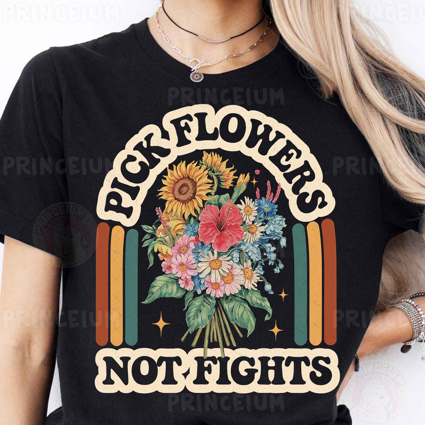 a woman wearing a black t - shirt that says pick flowers not fights