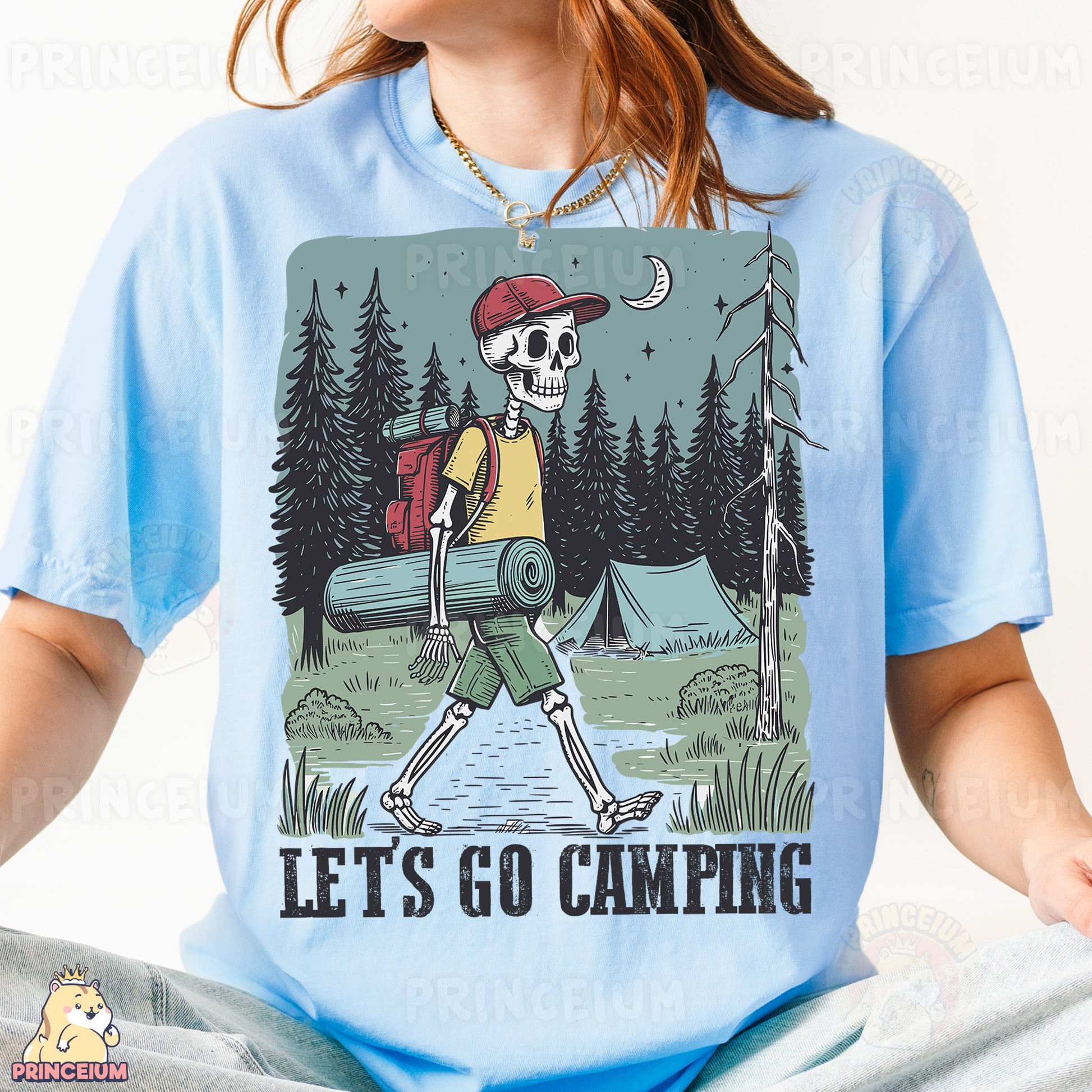 a woman wearing a blue shirt with a skeleton on it