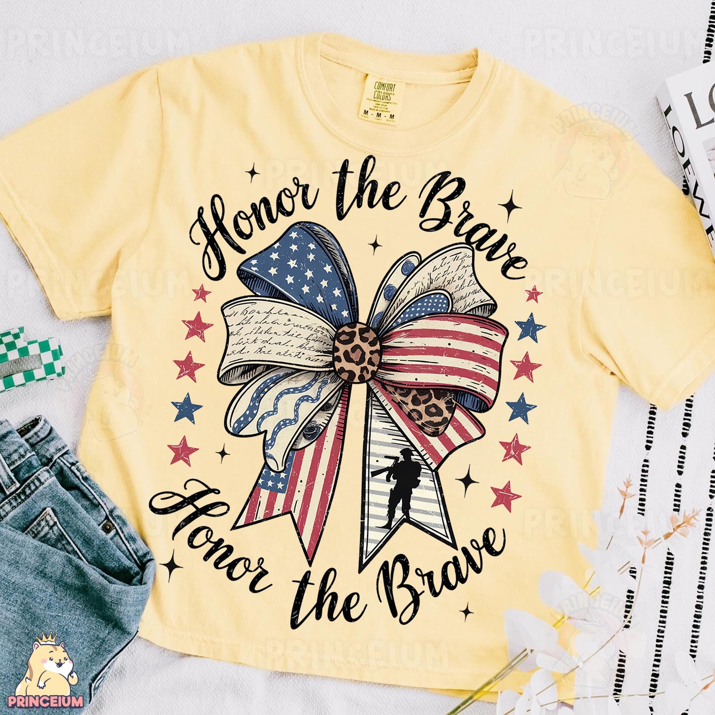 a t - shirt with a bow on it and a pair of jeans