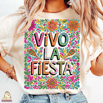 a woman wearing a t - shirt that reads vivo la fiesta fiesta