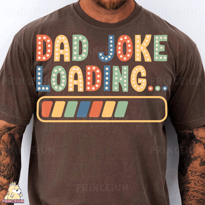 a man wearing a t - shirt that says dad joke loading