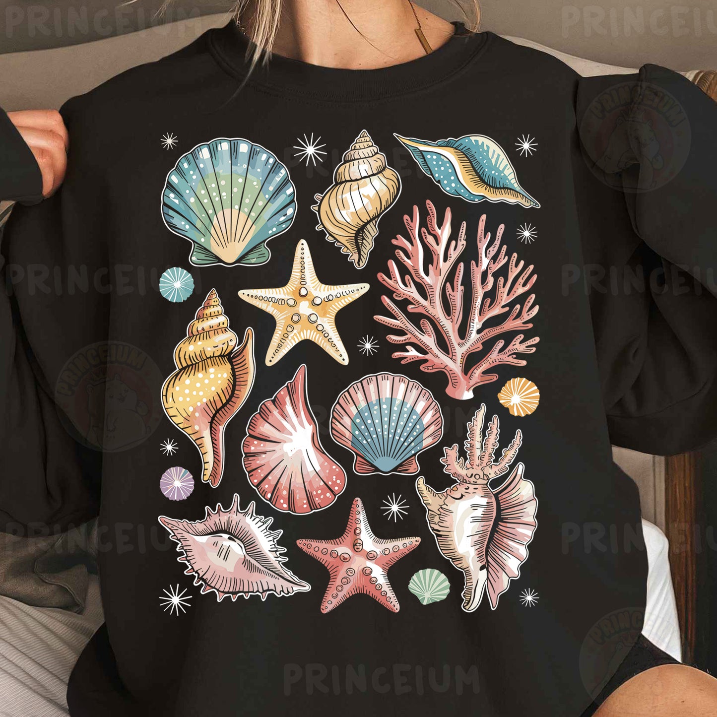 a woman wearing a black shirt with colorful seashells on it