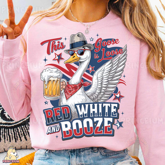 a woman wearing a pink shirt with a white goose on it