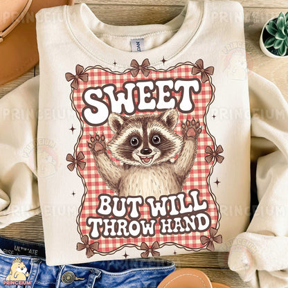 a shirt that says, sweet but will throw hand