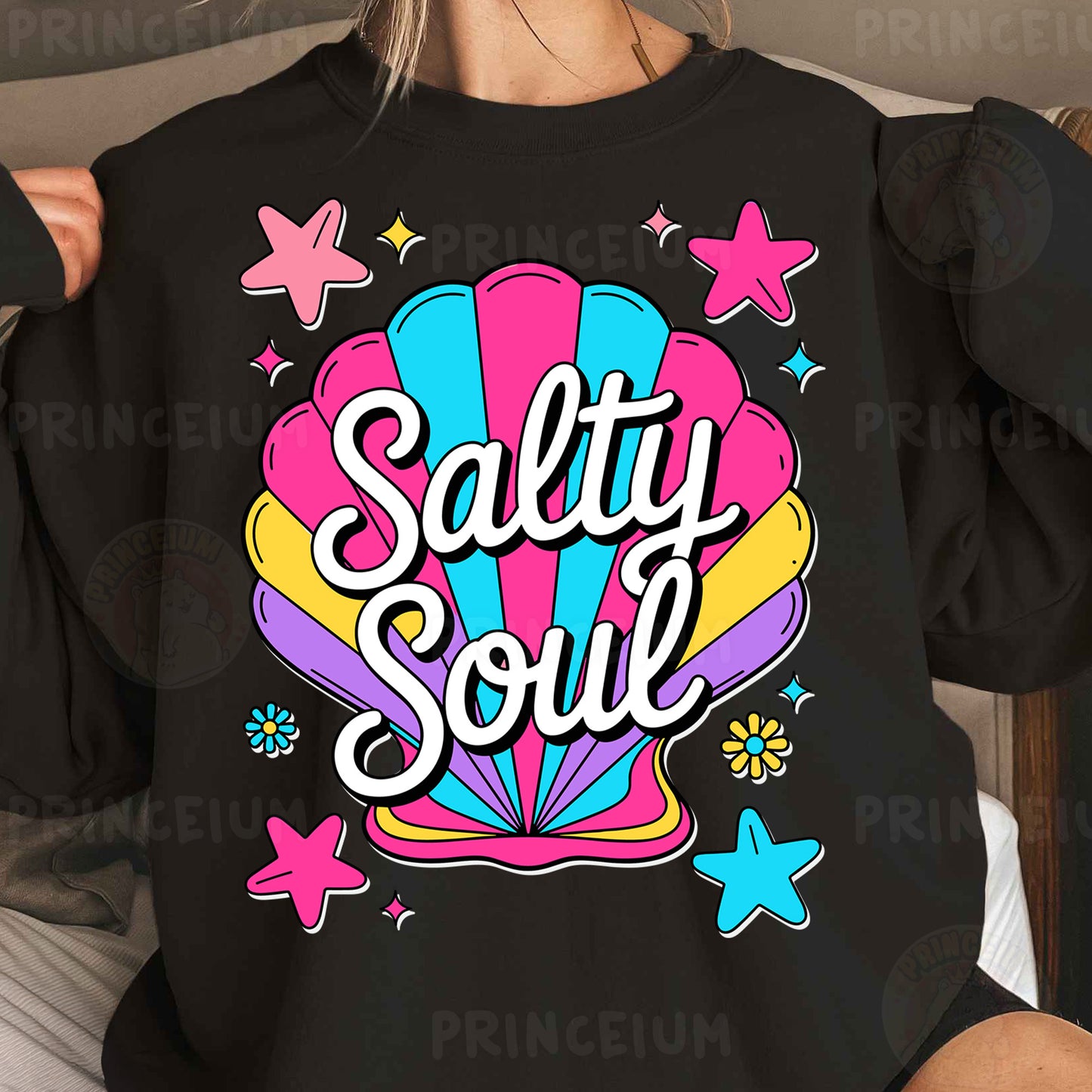 a woman wearing a black shirt that says salty soul