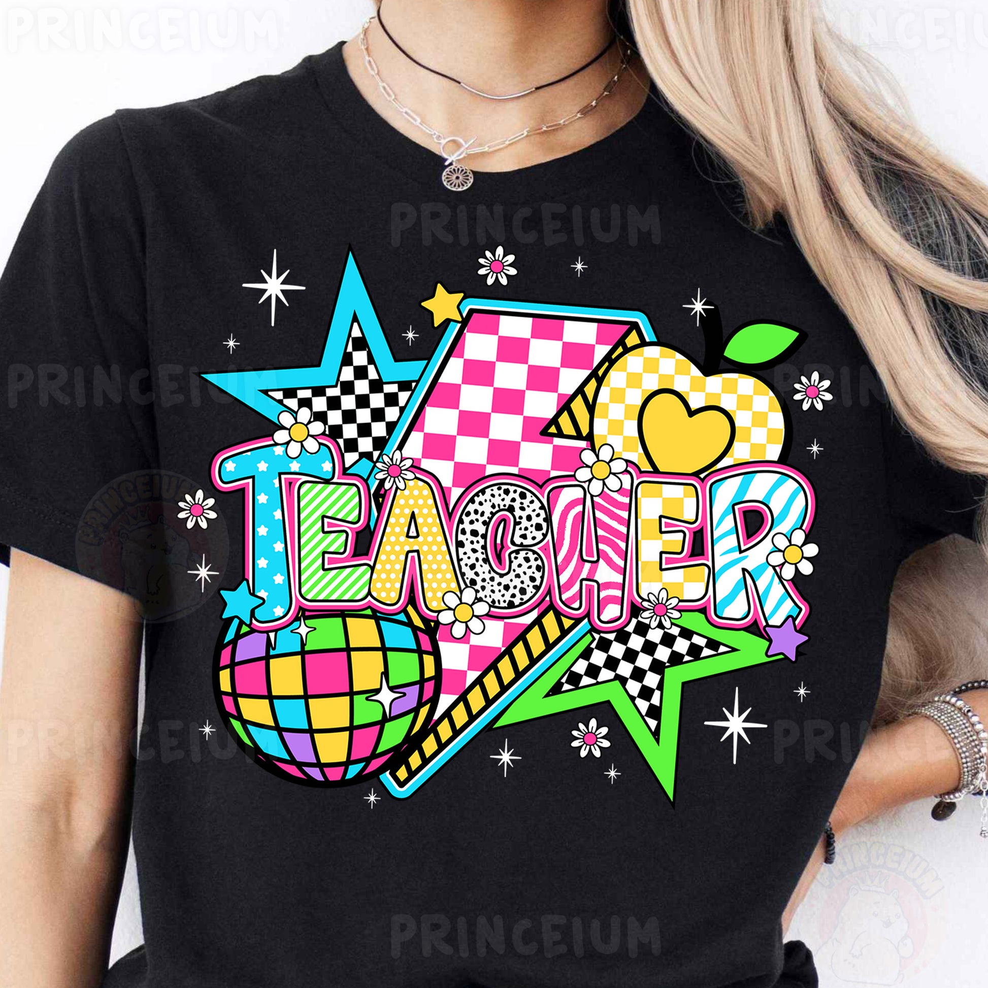 a woman wearing a black t - shirt with the word teacher on it