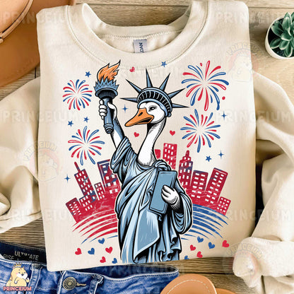 a t - shirt with the statue of liberty holding a torch