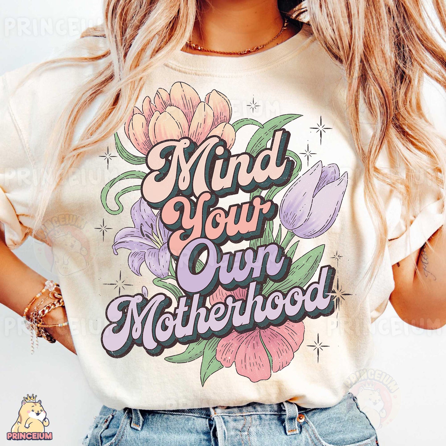 a woman wearing a t - shirt that says mind your own motherhood