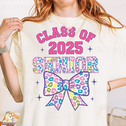 a woman wearing a class of 205 senior t - shirt