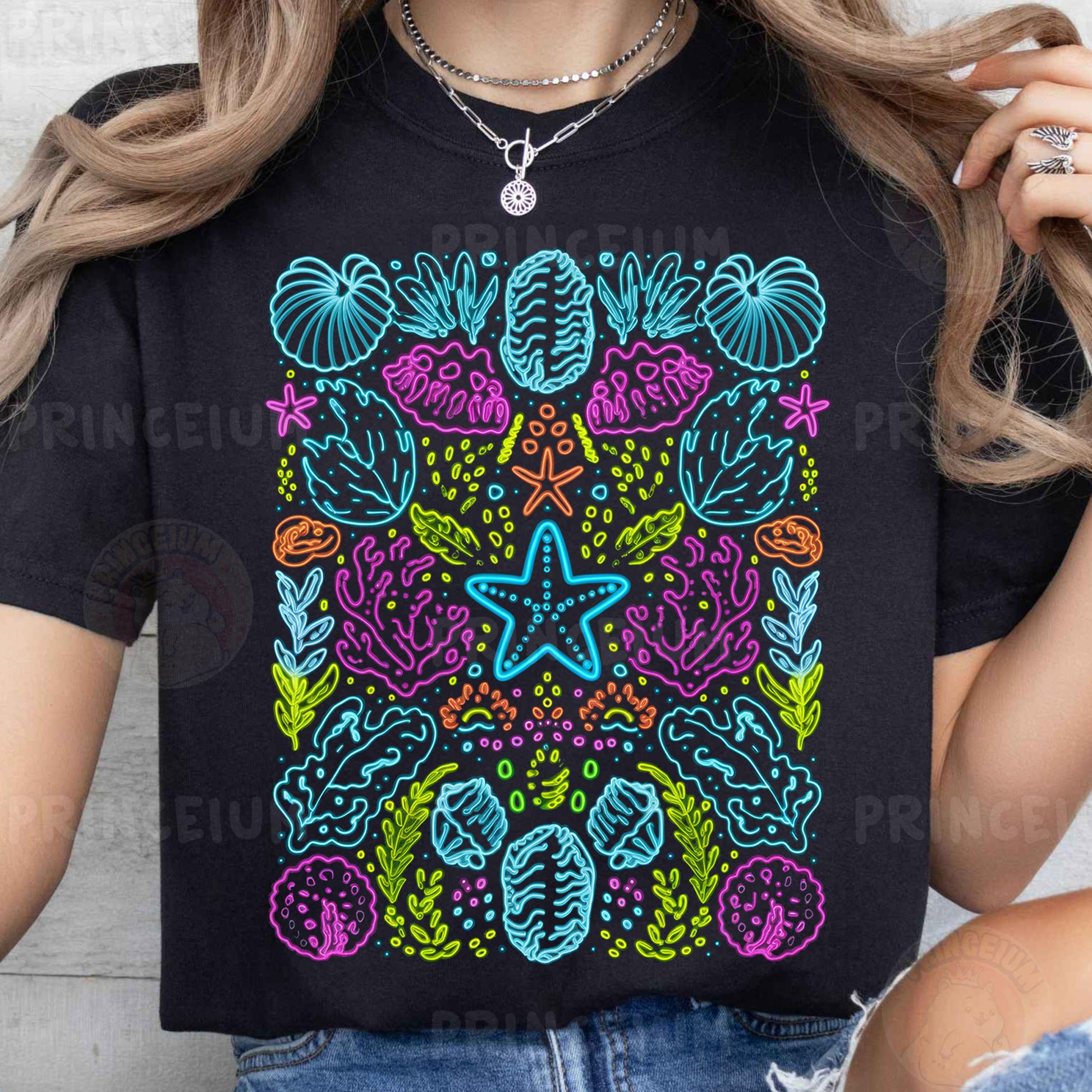 a woman wearing a black t - shirt with a colorful design