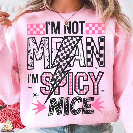 a woman wearing a pink sweatshirt that says i'm not mean i'm