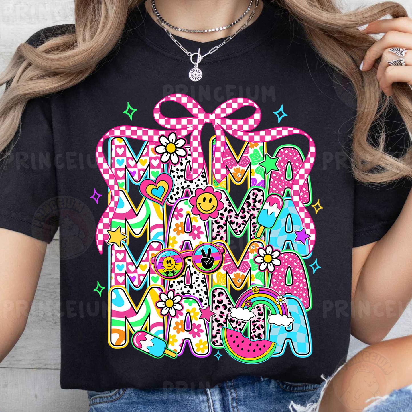 a woman wearing a black t - shirt with the word mama on it