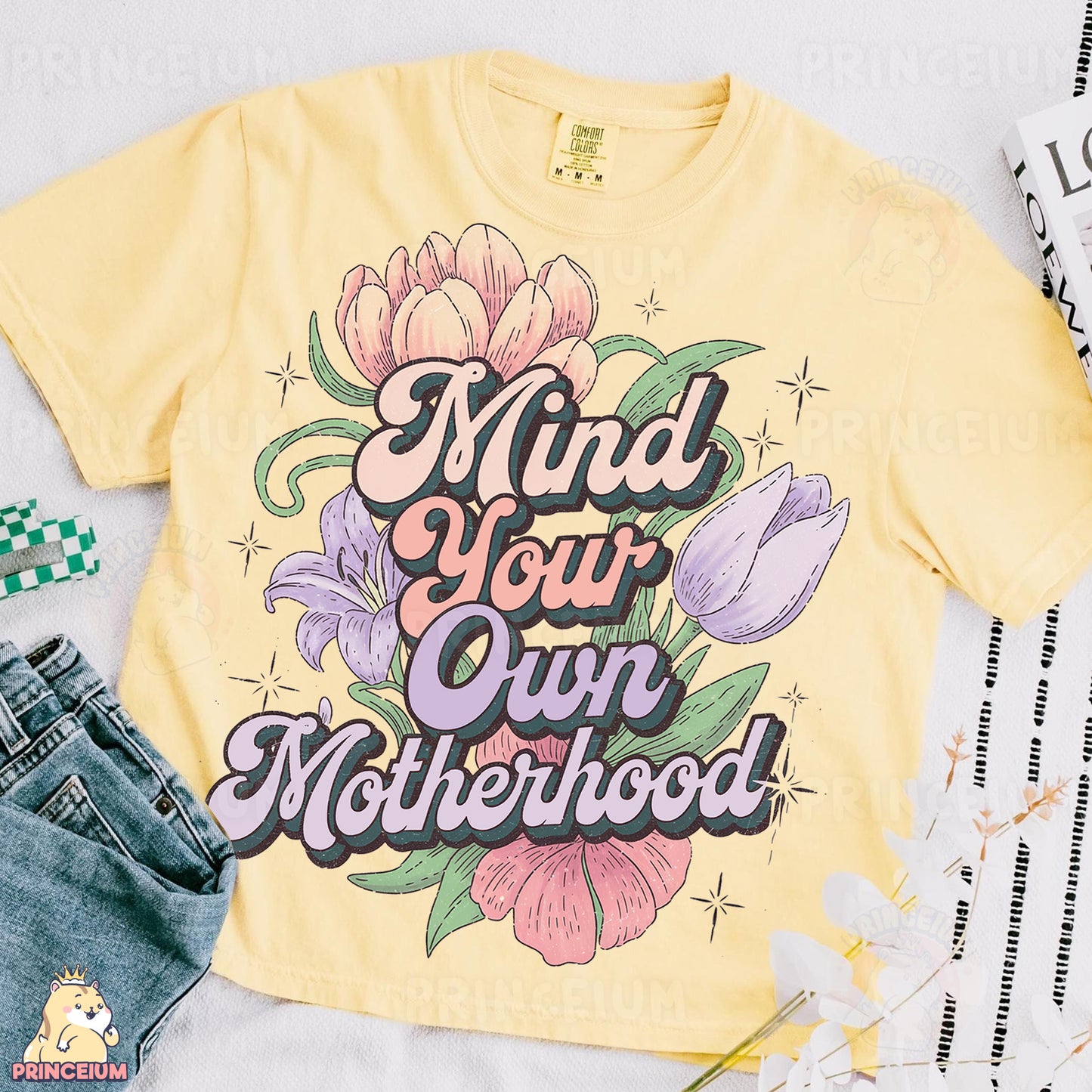 a t - shirt that says, mind your own motherhood
