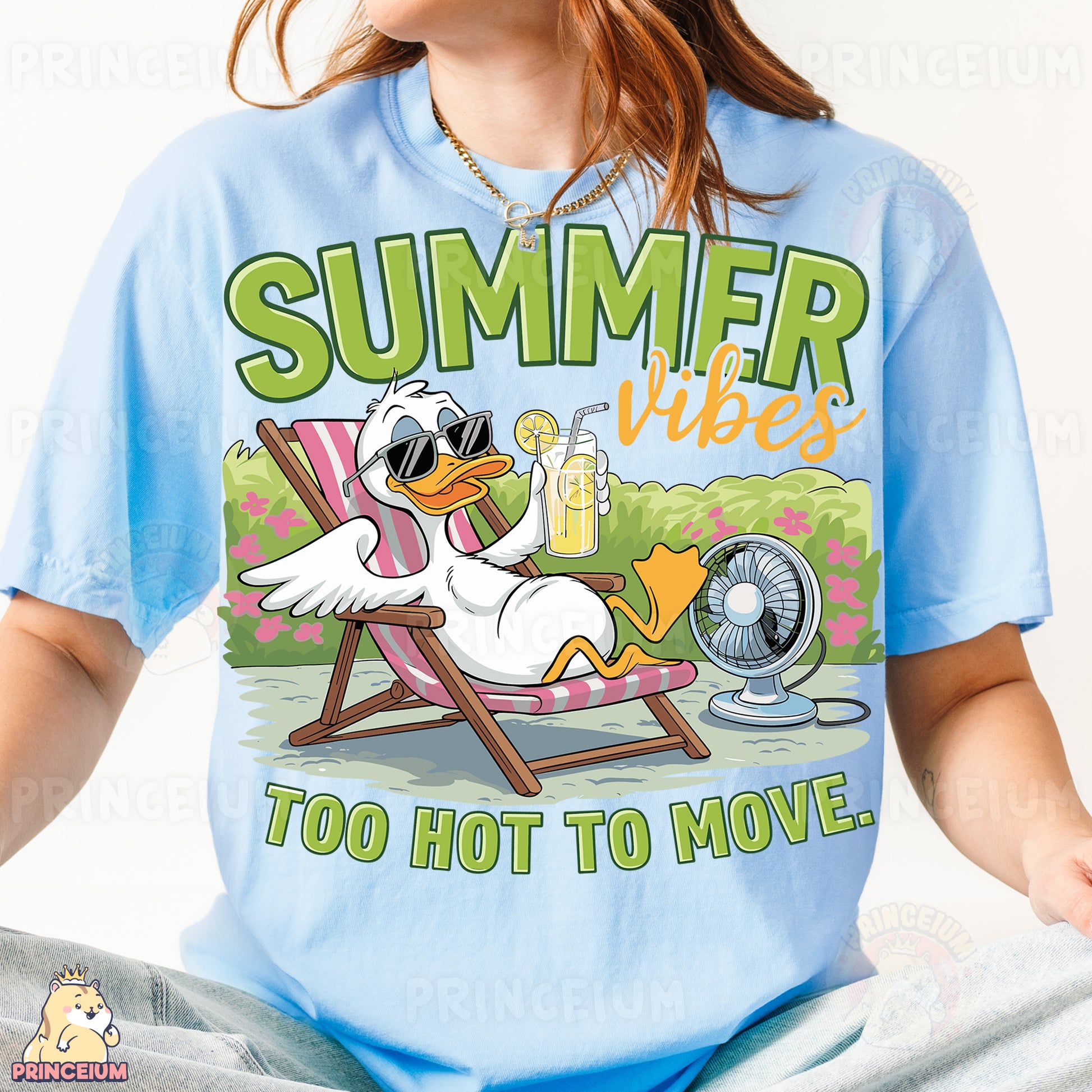 a woman wearing a blue shirt with a duck on it