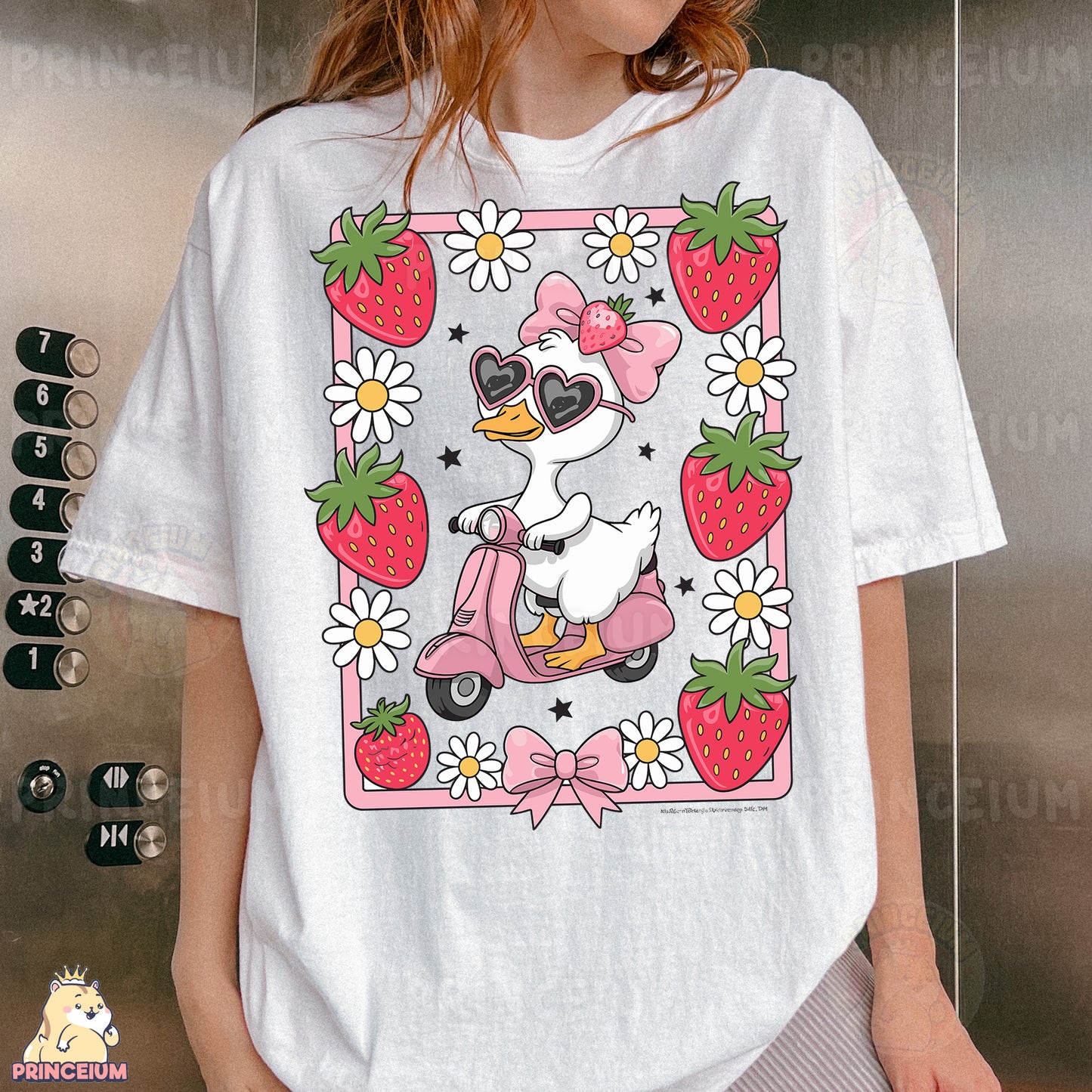 a woman wearing a t - shirt with a duck riding a scooter