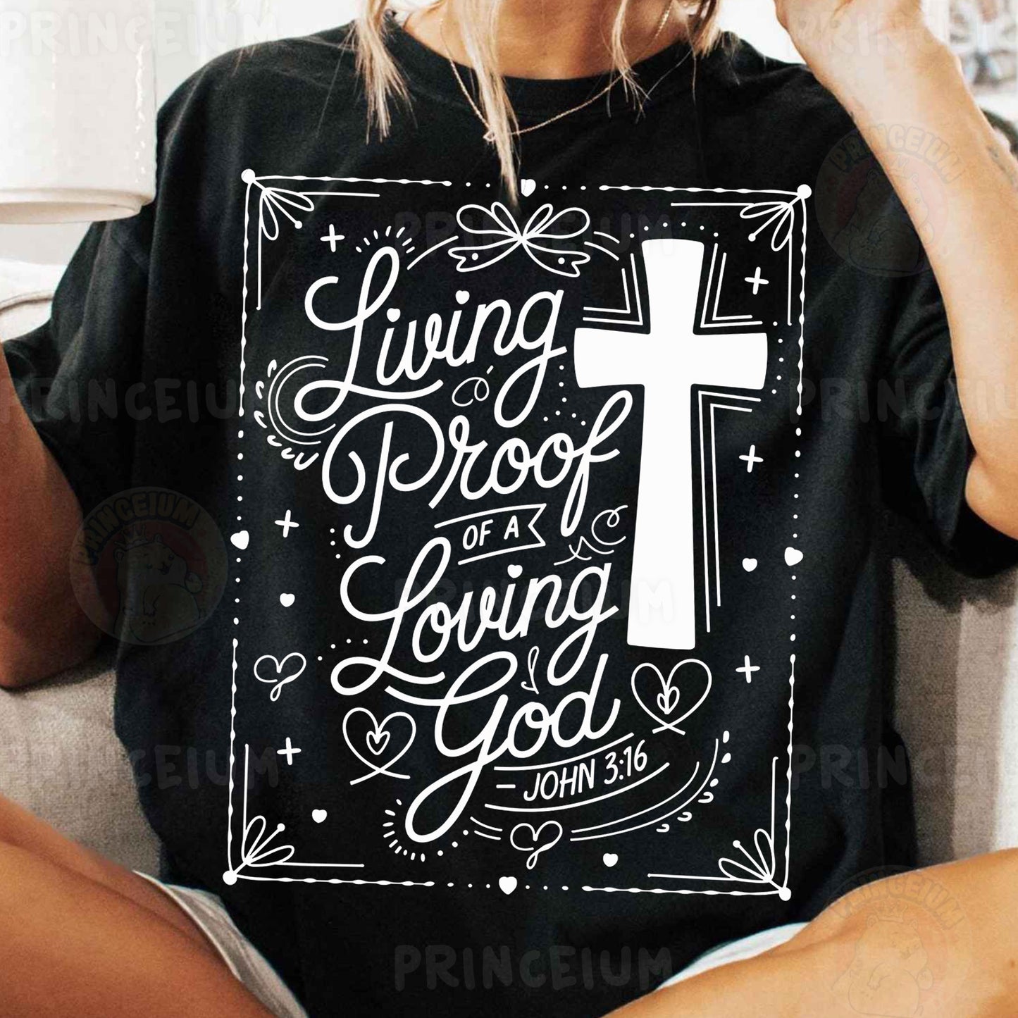 a woman sitting on a couch wearing a t - shirt with a cross on it