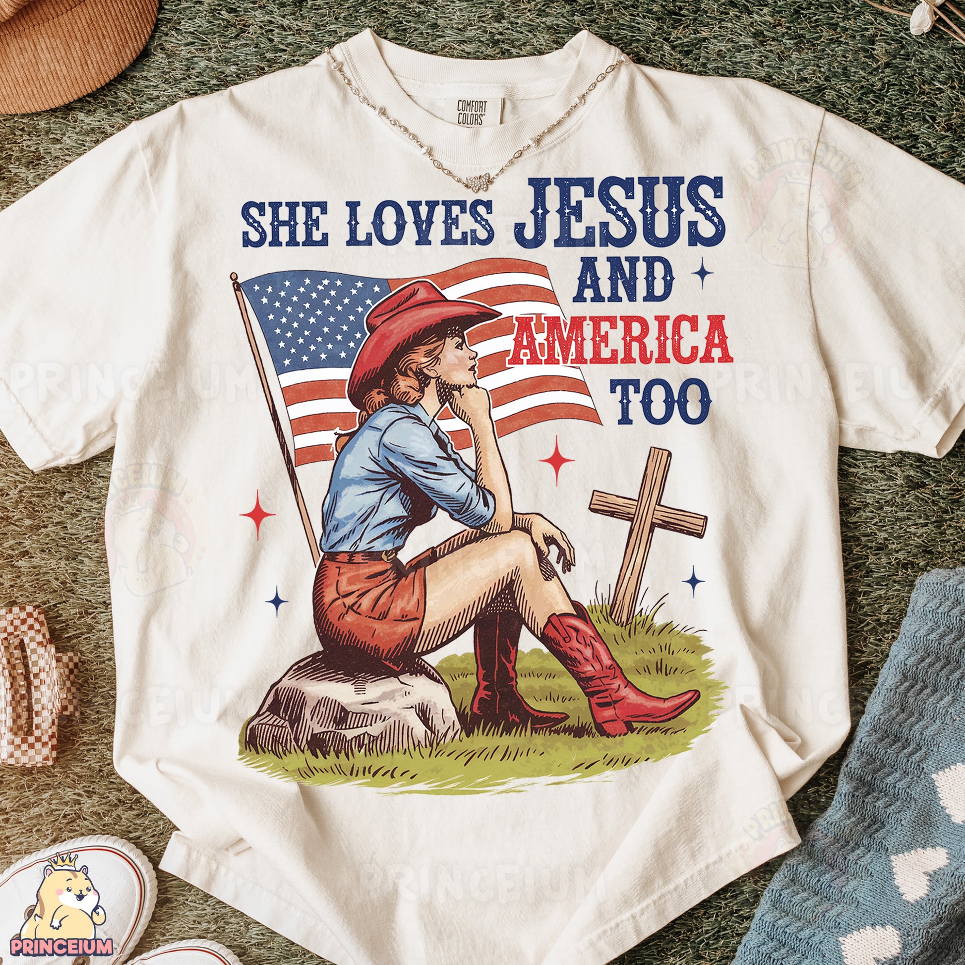 a t - shirt that says she loves jesus and america too