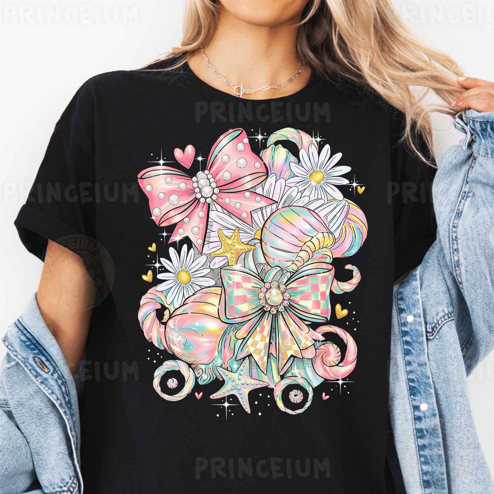 a woman wearing a black t - shirt with a pink bow and flowers on it