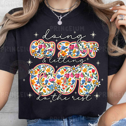 a woman wearing a black t - shirt with a floral design