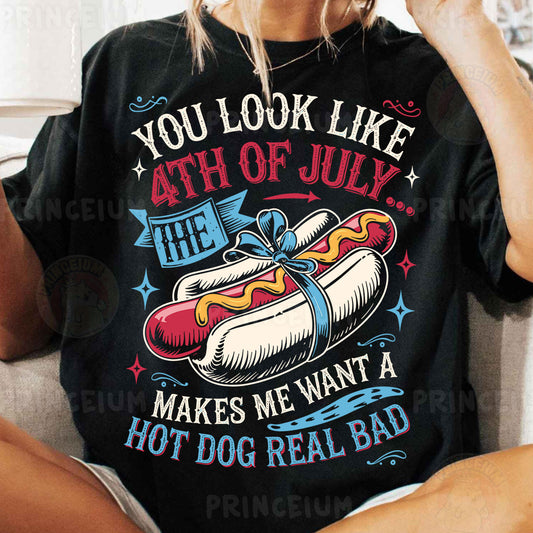 a woman sitting on a couch with a hot dog on her shirt