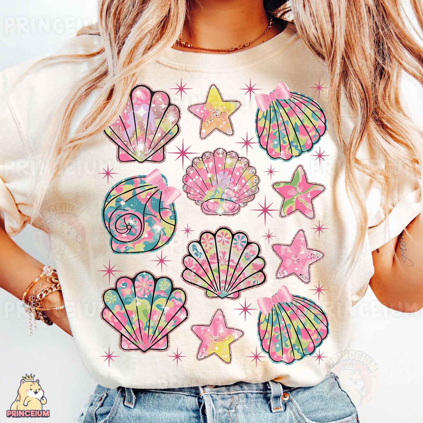 a woman wearing a t - shirt with shells and stars on it