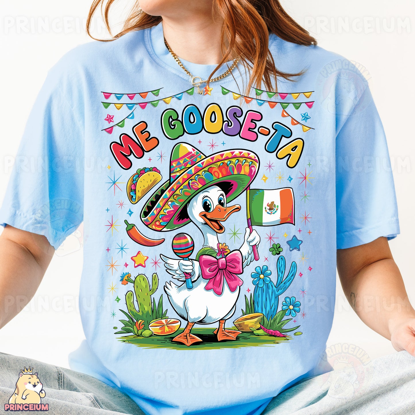 a woman wearing a blue shirt with a mexican duck wearing a sombrero