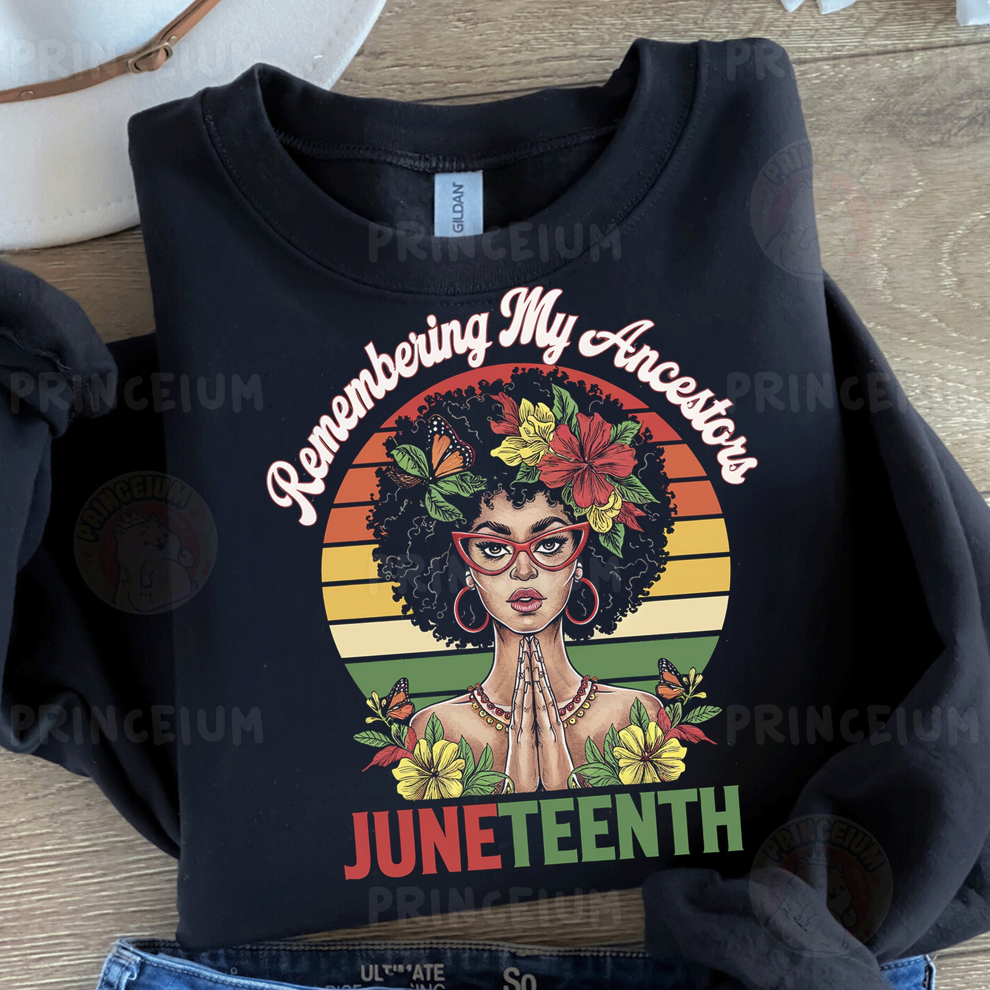 a black shirt with a picture of a woman wearing glasses