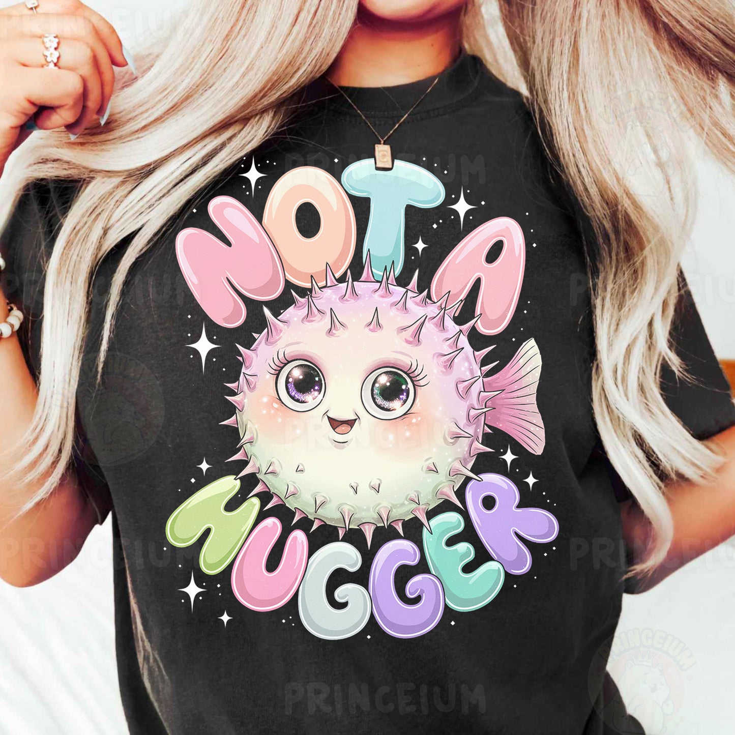 a woman wearing a black t - shirt with a pink puffy hedge on it