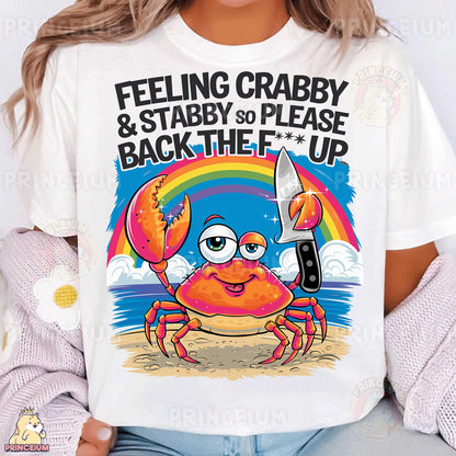 a woman wearing a t - shirt that says feeling crabby and stabby to