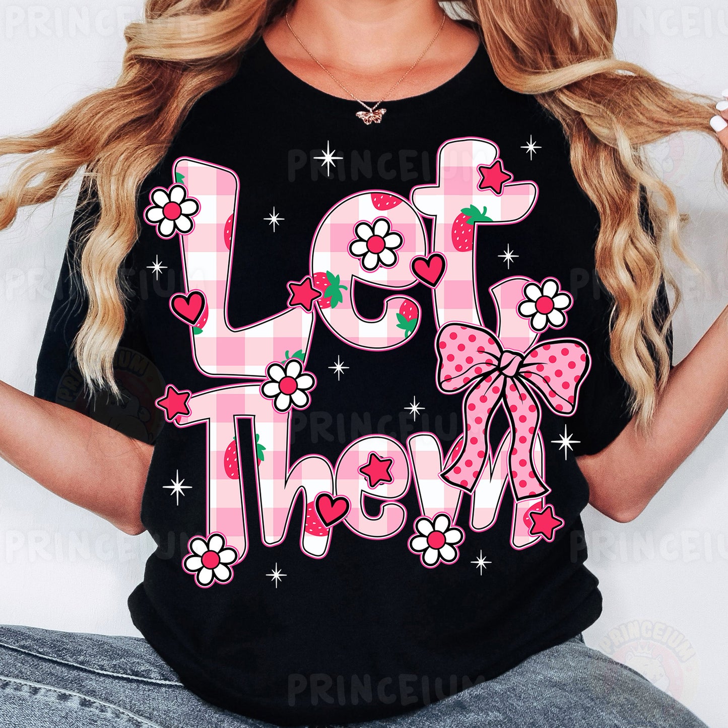 a woman wearing a black shirt with a pink bow